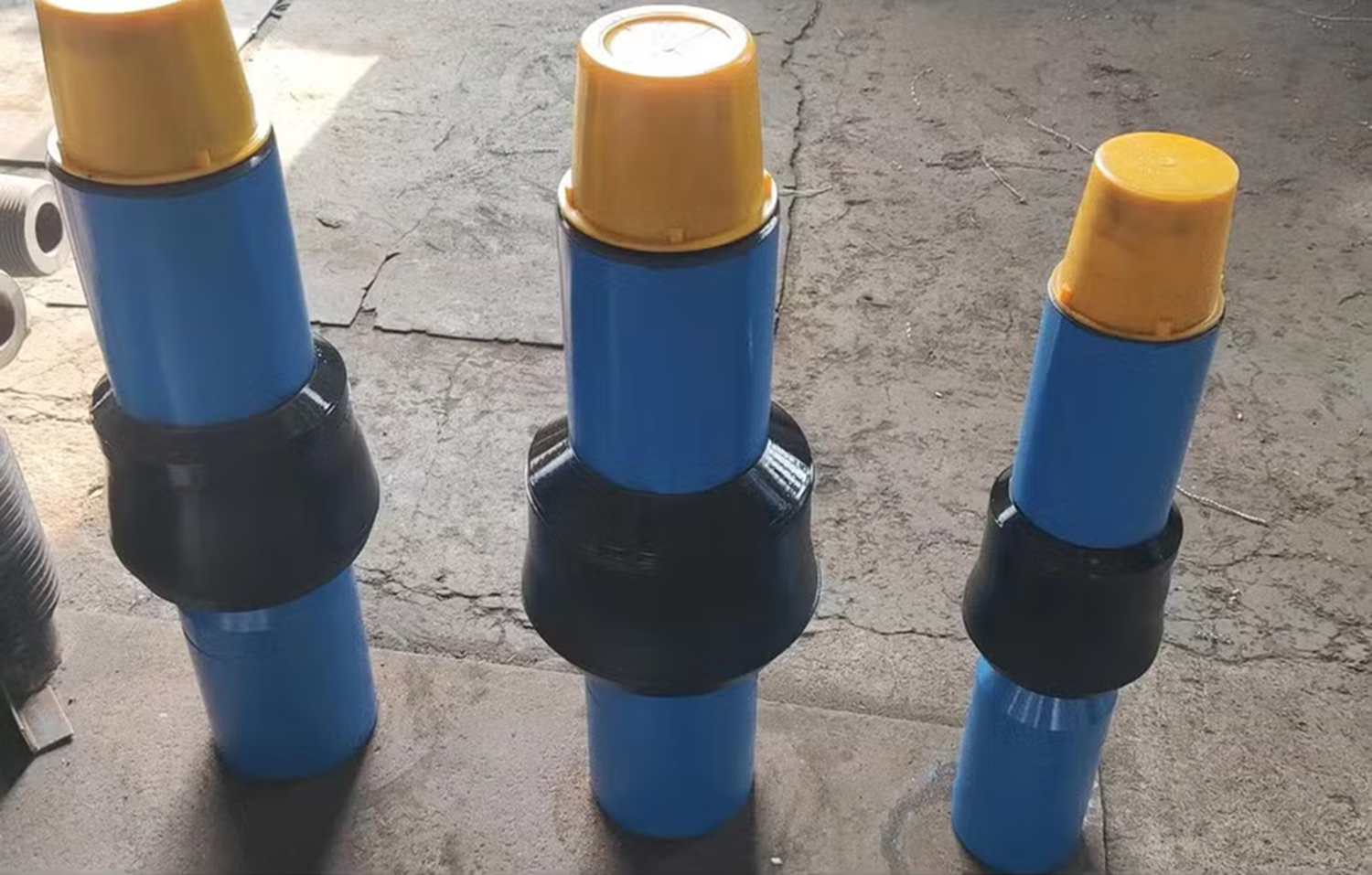 cup tester|sucker rod|coupling|joint|oildield equipment|rig|drilling|oil|petroleum